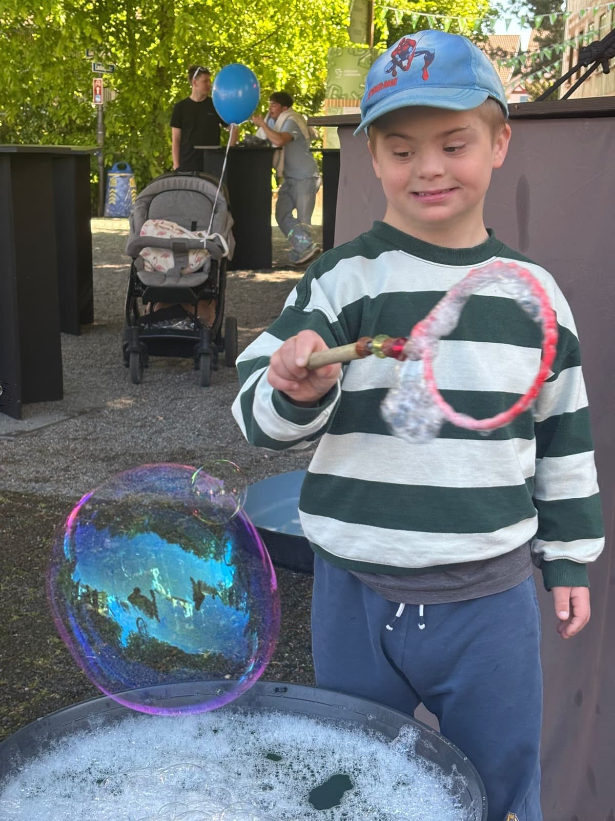 A soap bubble takes shape